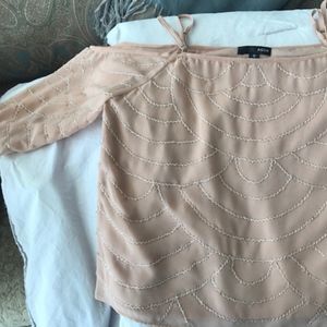 Beaded open shoulder top. Short Sleeved. Size M